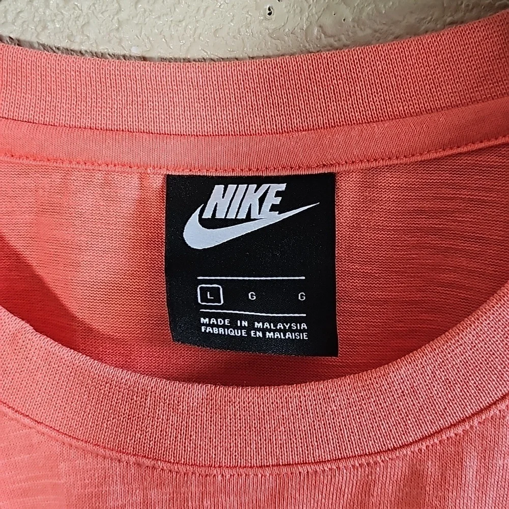 Nike Zip Pocket T-Shirt.